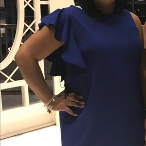 Ruffled should sheath dress.  Knee length